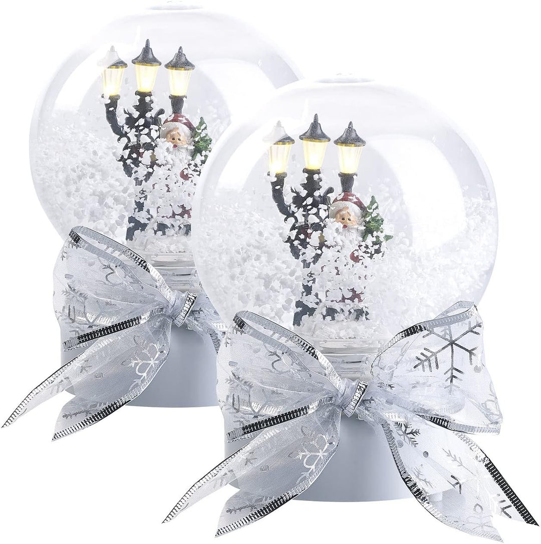 infactory Schneekugel: 2er-Set Schneekugeln mit singendem Weihnachtsmann, LED-Laterne (Schneekugel W