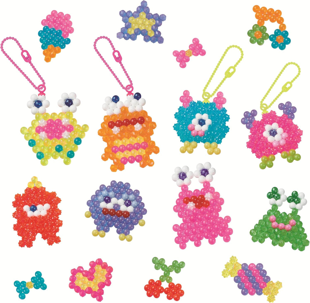 Aquabeads - 35144 Verrückte Monster Bastelset, Wasserperlen Bastelset für Kinder ab 4 Jahren, Bastel