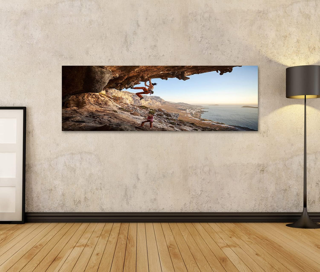 islandburner Bild auf Leinwand Junge Frau Klettert An Höhlenwand Am Meer Bilder Wandbilder Poster Le