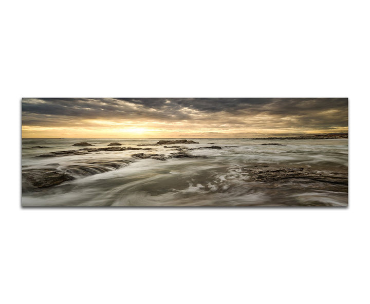 Paul Sinus Art Panoramabild auf Leinwand und Keilrahmen 150x50cm Meer Steine Felsen Wolken Sonnenauf