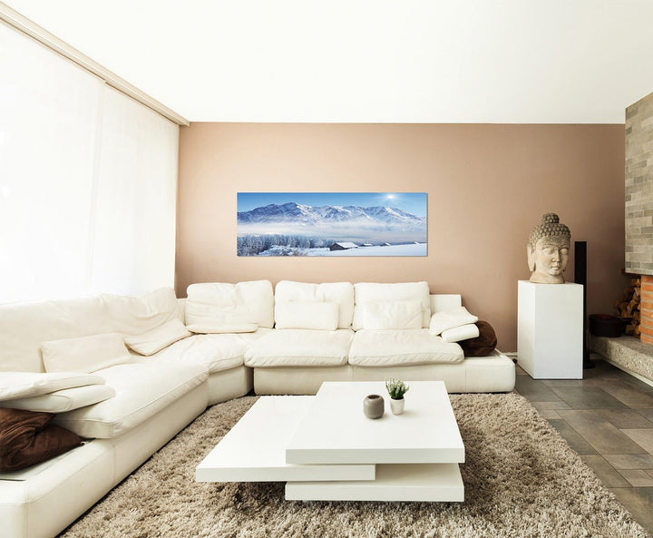 Paul Sinus Art Panoramabild auf Leinwand und Keilrahmen 150x50cm Winterlandschaft Berge Wald Häuser