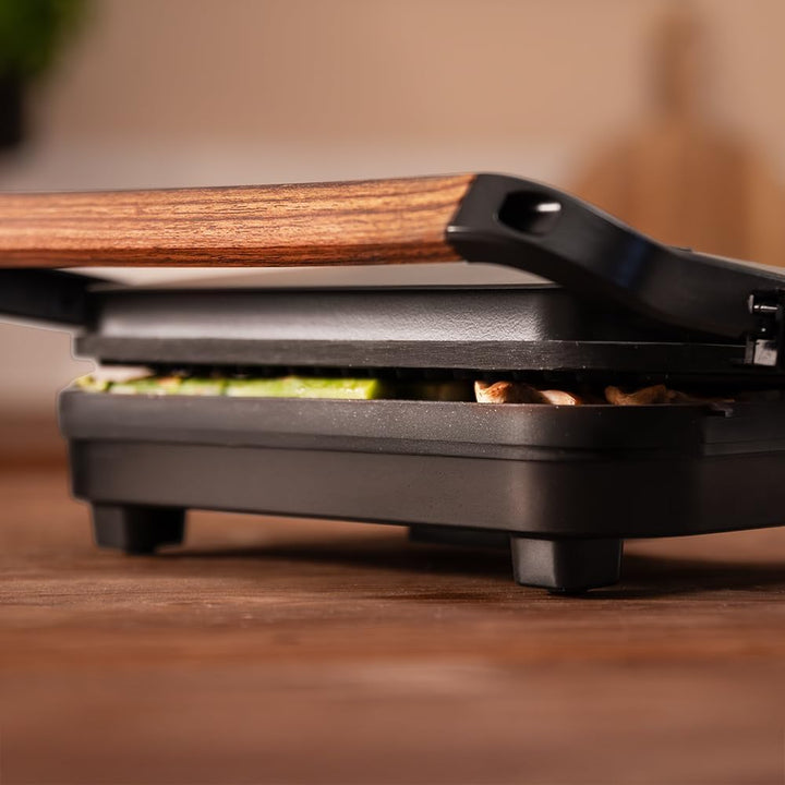 Cecotec Elektrischer Grill Rock'Ngrill 1300 Wood B. Leistung von 1300W, schwarzes Design, Rockstone-