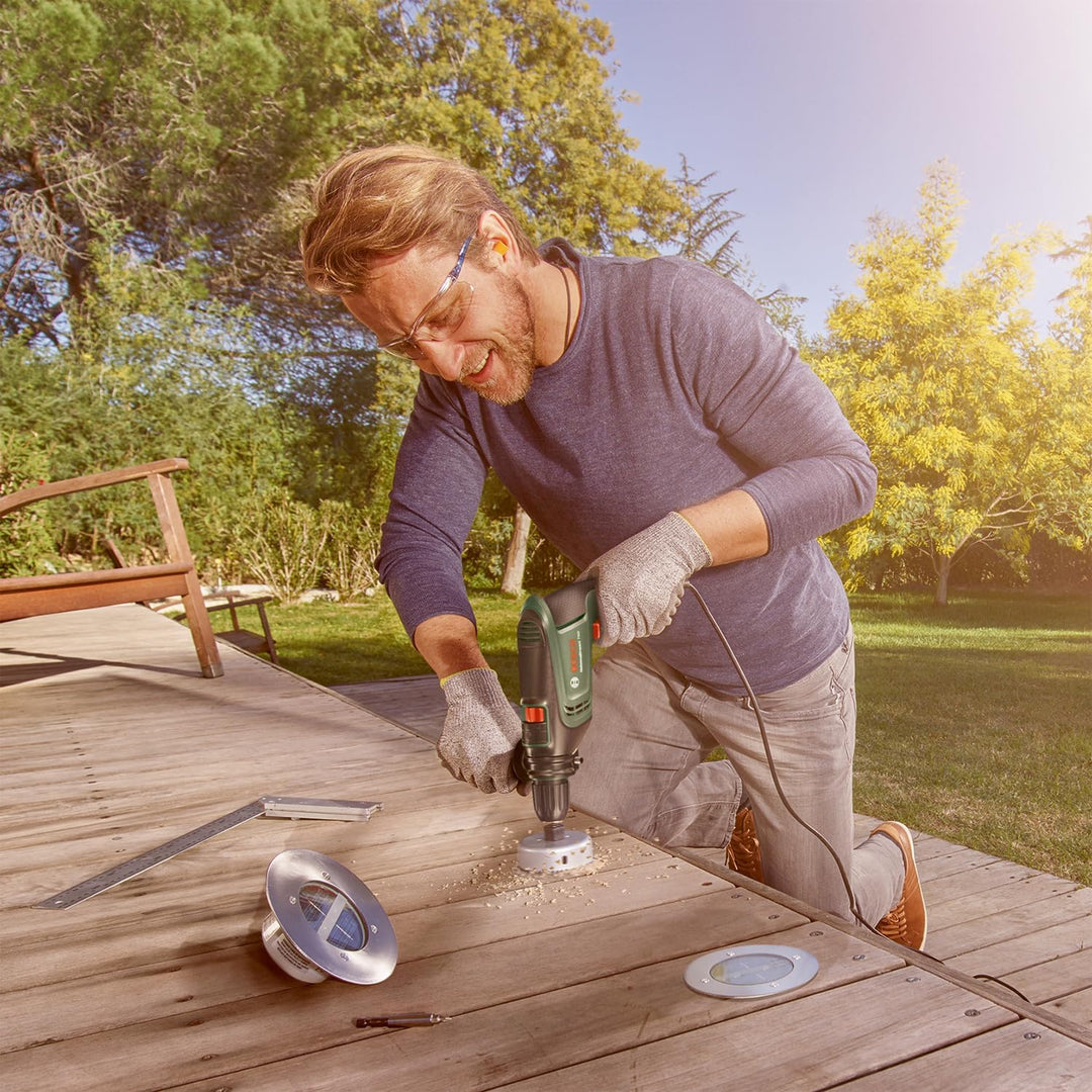 Bosch Schlagbohrmaschine UniversalImpact 730 (Präzisionsbohren in Mauerwerk, Holz und Stahl; 730-Wat