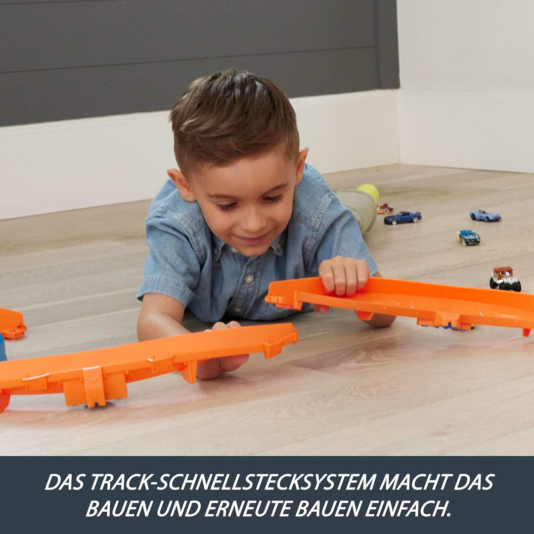 Hot Wheels Spielzeugauto Streckenset, Deluxe-Bauset mit motorisiertem Beschleuniger, Fahrzeug im Mas