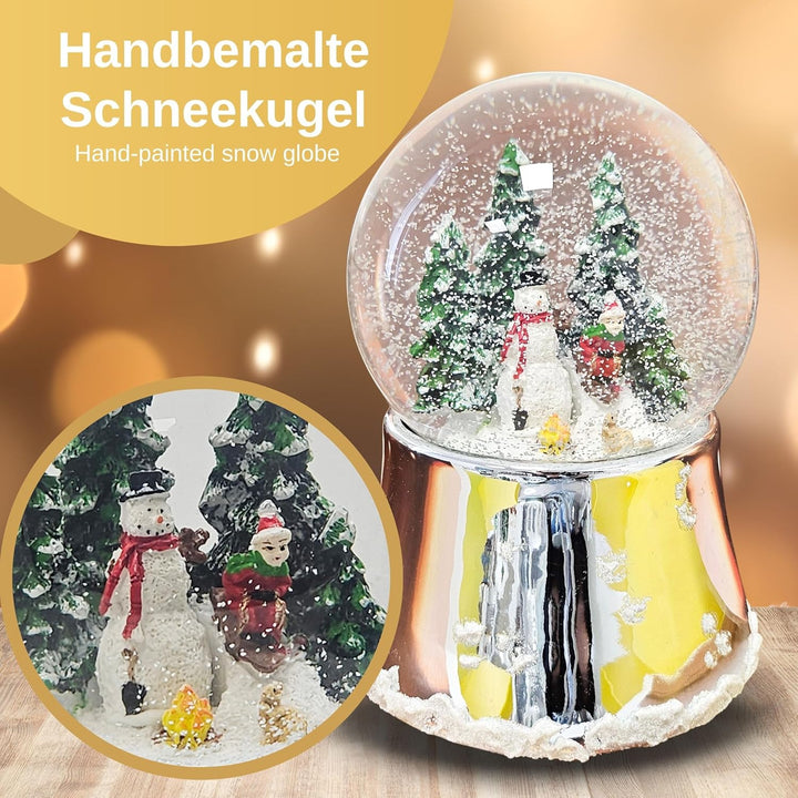 Schneekugel Weihnachten Spieluhr | Schneemann Steht mit Kind auf Schlitten | Sockel Silber glänzend