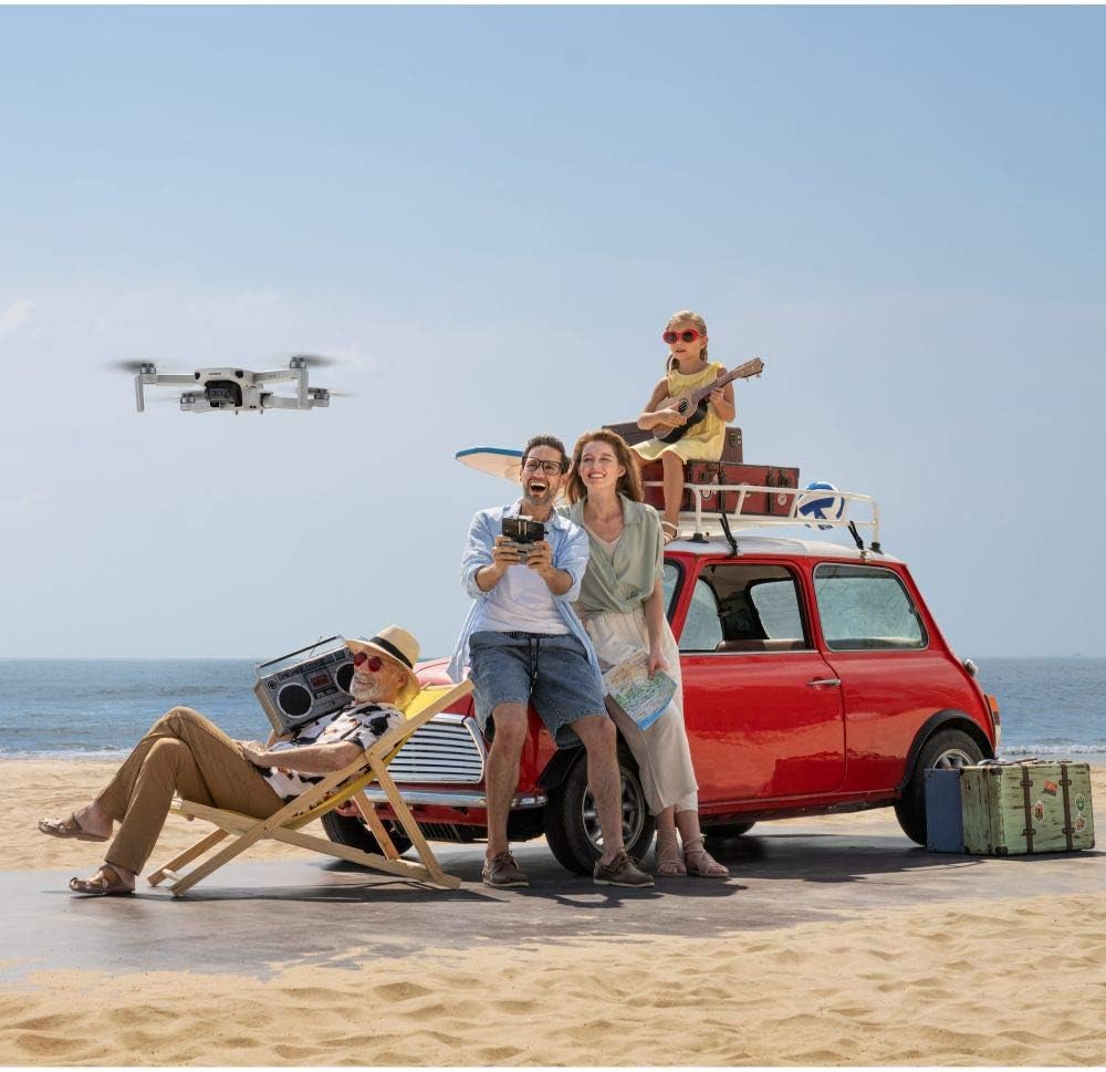 DJI Mini 2 - Ultraleichter und faltbarer Drohnen-Quadkopter, 3-Achsen-Gimbal mit 4K-Kamera, 12MP Fot