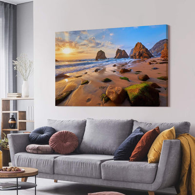 PICANOVA – Bild auf Leinwand Meeresstrand mit Felsen 120x80cm – Leinwandbild – Premium Leinwanddruck