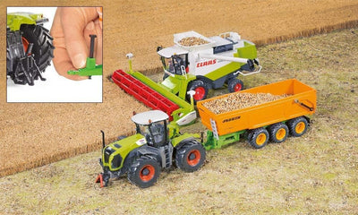 siku 3271, Claas Xerion 5000 Traktor, 1:32, Metall/Kunststoff, Grün, Achsschenkellenkung und Kupplun