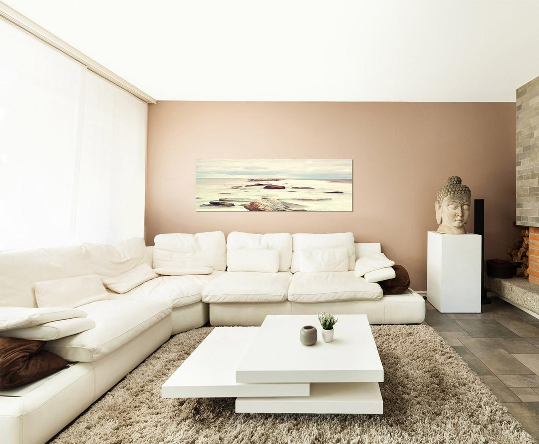 Paul Sinus Art Panoramabild auf Leinwand und Keilrahmen 150x50cm Meer Steine Nebel Wolken