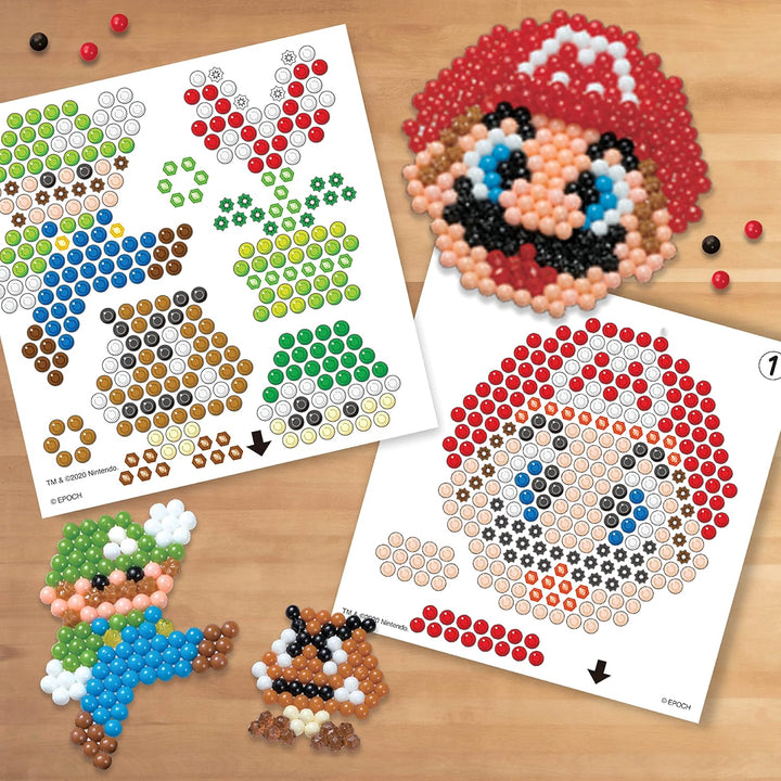 Aquabeads 31774 Kreativ Würfel - Super Mario - Bastelset, grün & 31520 Glitzerperlen - Nachfüllset N