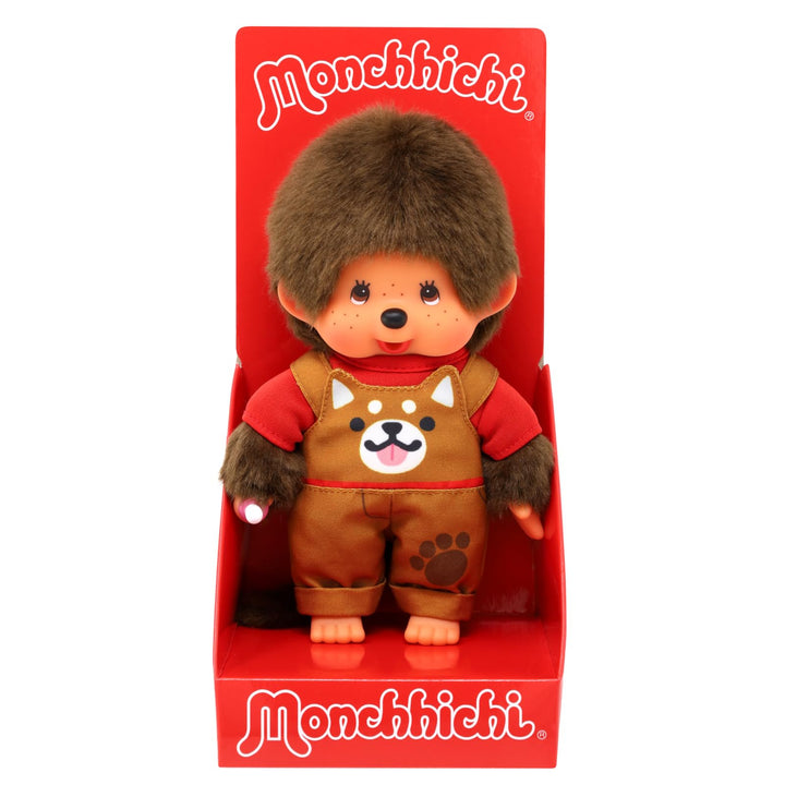 Sekiguchi 203864 - Original Monchhichi Junge mit Latzhose und Shiba Inu Motiv, ca. 20 cm grosses Kus