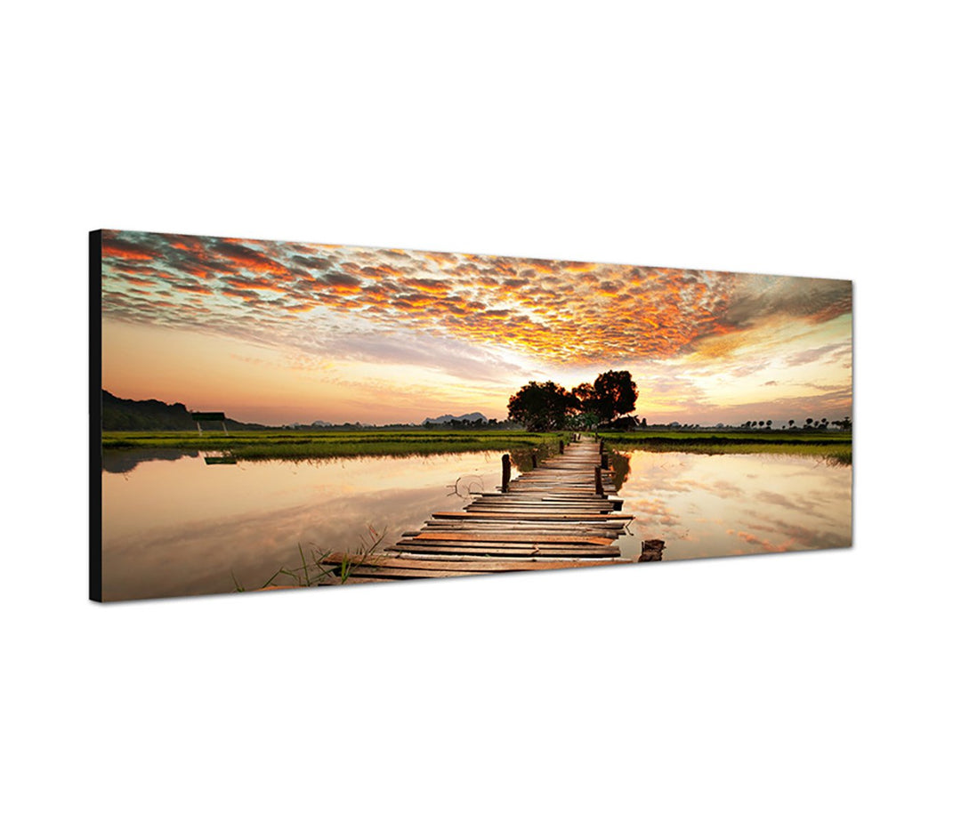 Augenblicke Wandbilder Leinwandbild als Panorama in 150x50cm Tropen Fluss Steg Sonnenuntergang Wolke