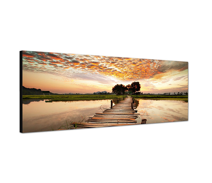Augenblicke Wandbilder Leinwandbild als Panorama in 150x50cm Tropen Fluss Steg Sonnenuntergang Wolke