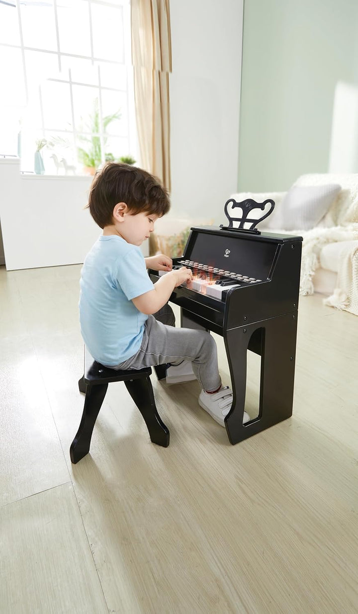 Hape Leuchttasten-Piano mit Hocker und Notenhalter, Musikspielzeug aus Holz, ab 3 Jahren, Schwarz