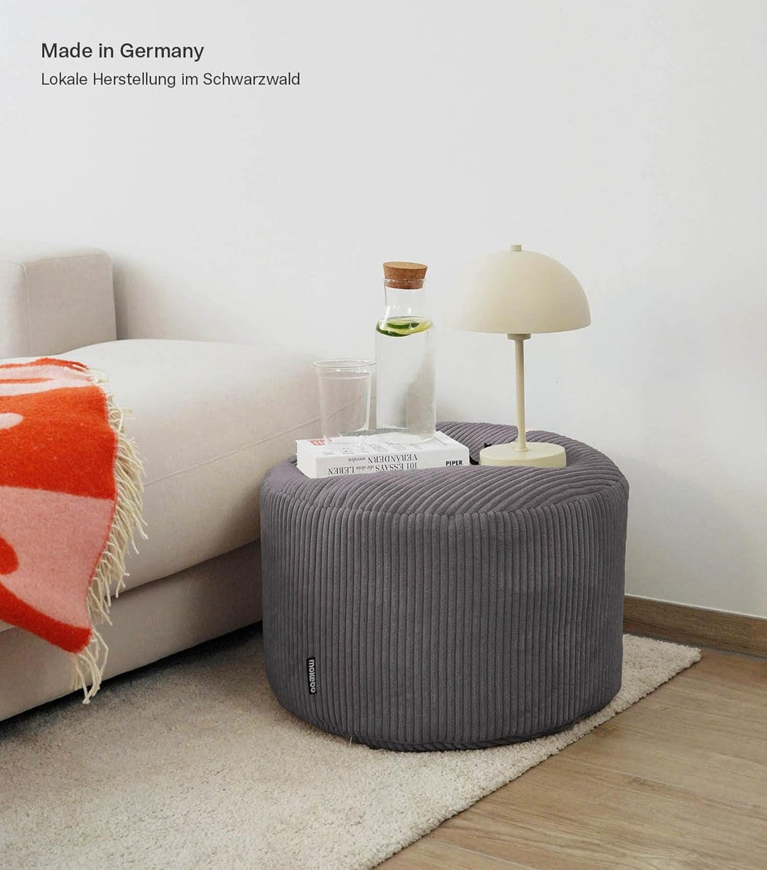 mokebo® Pouf, Hocker o. Sitzhocker aus Cord 40x60 cm 'Der Faule Lenz', Bodenkissen rund Anthrazit, F