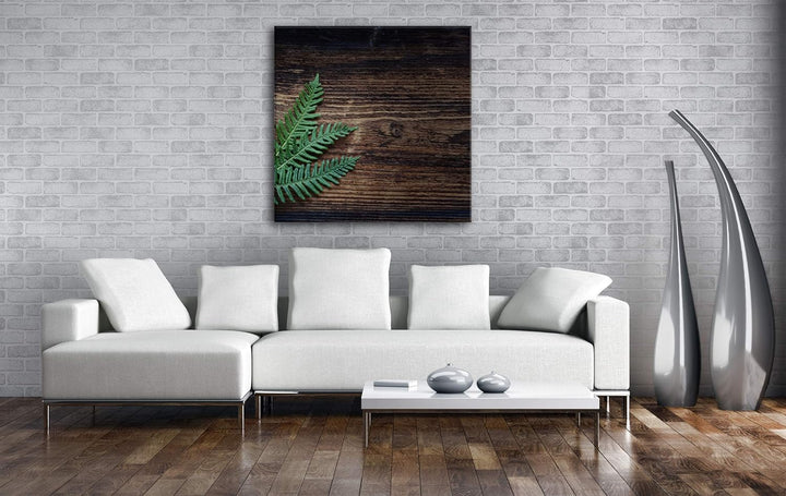 deyoli Kleiner grüner Farn auf Einer Holztischplatte Format: 70x70 als Leinwand, Motiv fertig gerahm