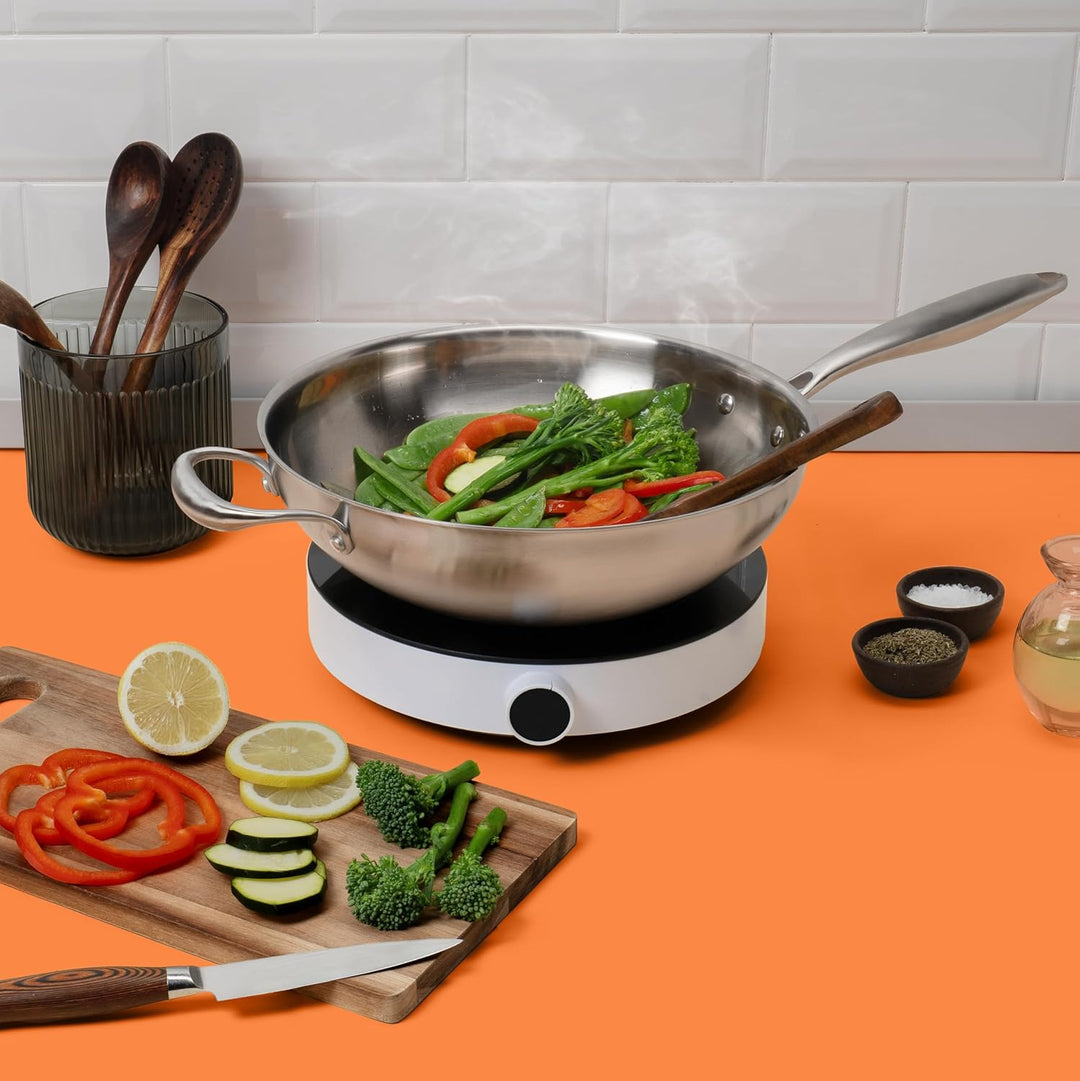 Reishunger Unbeschichteter Edelstahl Wok – 30 cm Durchmesser – mit ofenfestem Deckel – Für alle Herd