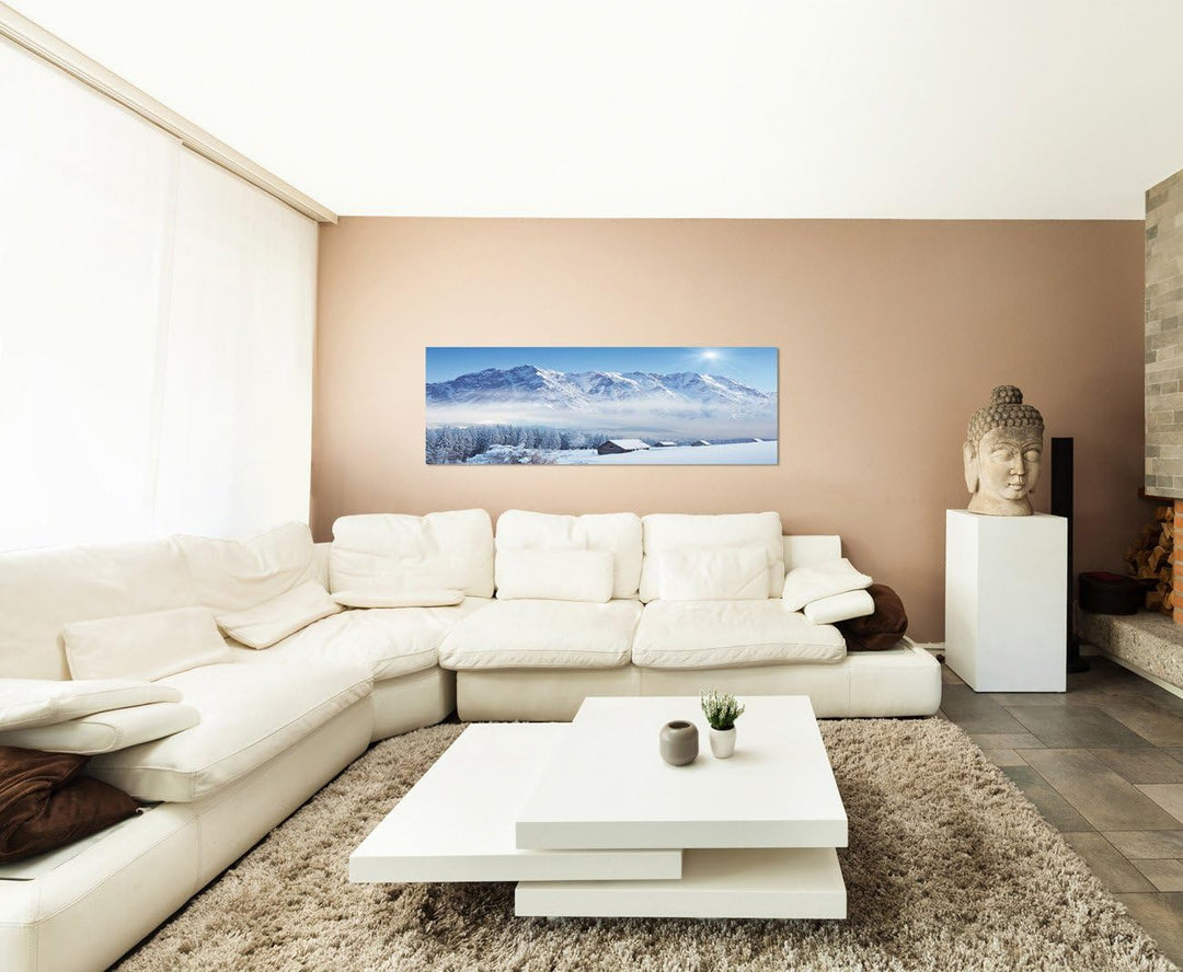 Paul Sinus Art Panoramabild auf Leinwand und Keilrahmen 150x50cm Winterlandschaft Berge Wald Häuser