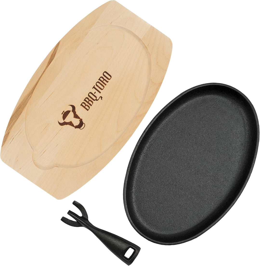 BBQ-Toro Gusseisen Servierpfännchen mit Holzunterlage (4 Stück) | 27 x 18 x 3 cm - oval | bereits ei