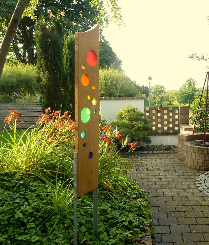 Gartenskulptur aus Holz und Glas. Gartendekoration als Unikate handgefertigt und wetterfest