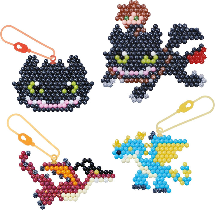 Aquabeads - 35124 Dragons Schlüsselanhänger Bastelset, Wasserperlen Bastelset mit Hicks, Ohnezahn, f