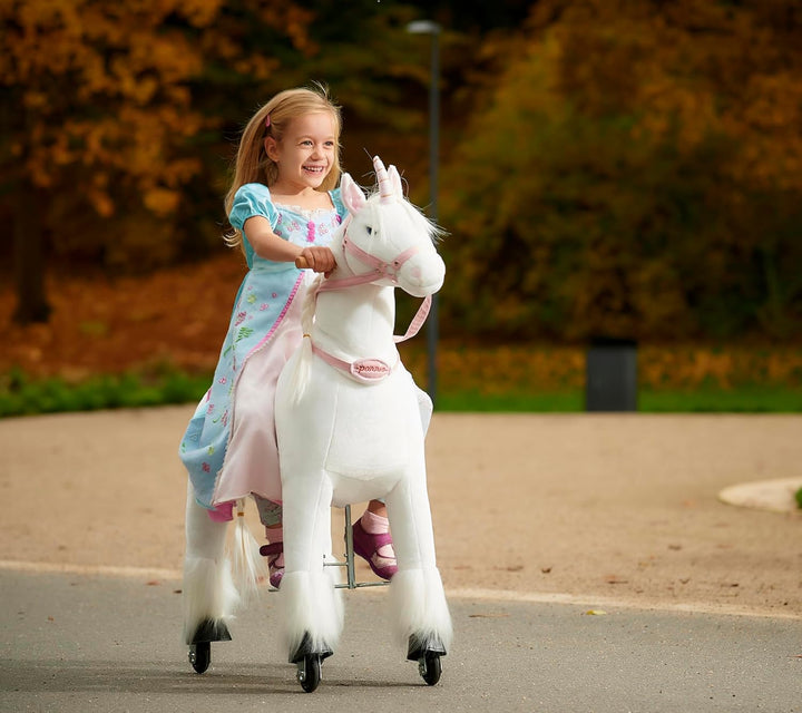 Ponnie Einhorn auf Rollen Merlin - Unicorn M mit rosa Sattel