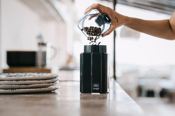 Melitta Amigo Kaffeemühle – Elektrische Kaffeemühle mit Schlagmesser aus Edelstahl für bis zu 60g Ka