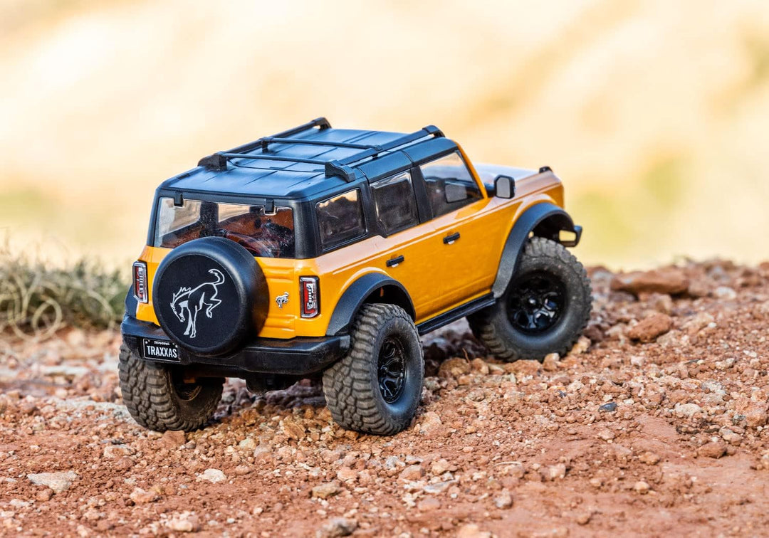 TRAXXAS TRX-4M Ford Bronco 4x4 gelb 1/18 Crawler RTR Brushed, mit Akku und USB Ladegerät