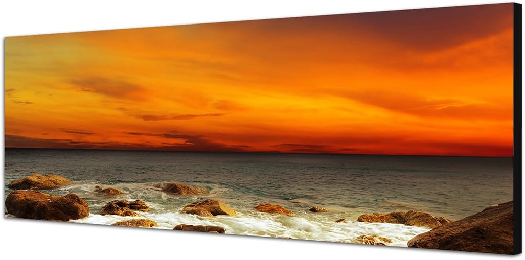Paul Sinus Art Panoramabild auf Leinwand und Keilrahmen 150x50cm Meer Steine Felsen Abendrot Landsch