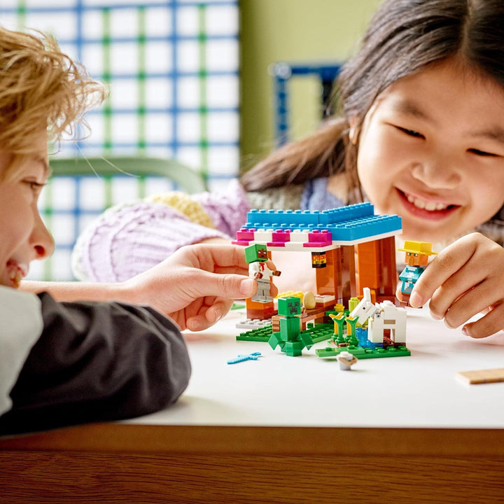 LEGO 21184 Minecraft Die Bäckerei modulares Spielzeug-Set mit Creeper- und Ziege-Figur, Konstruktion