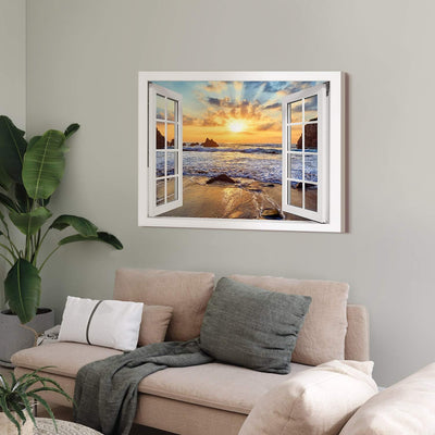 PICANOVA – Bild auf Leinwand Felsiger Strand Sonnenuntergang Fenster 80x60cm – Leinwandbild – Premiu