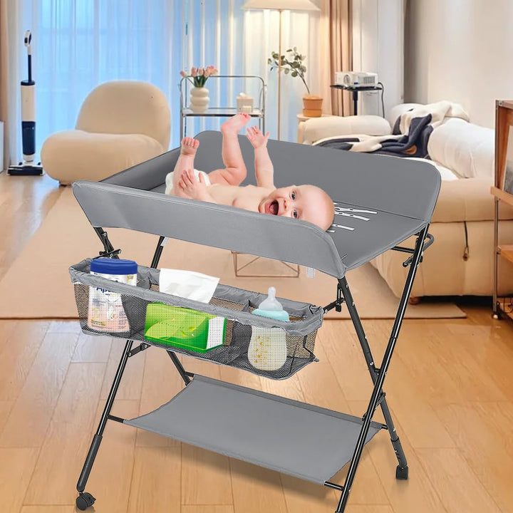 Baby Klappbarer Wickeltisch，Mobiler Wickeltisch mit Rollen und Wickelauflage,Wasserdicht und Höhenve