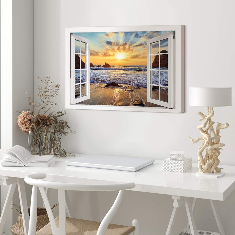 PICANOVA – Bild auf Leinwand Felsiger Strand Sonnenuntergang Fenster 60x40cm – Leinwandbild – Premiu