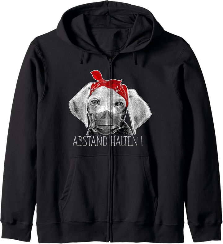 Abstand Halten - Hund Welpe mit Mundschutz Gesichtsmaske Kapuzenjacke