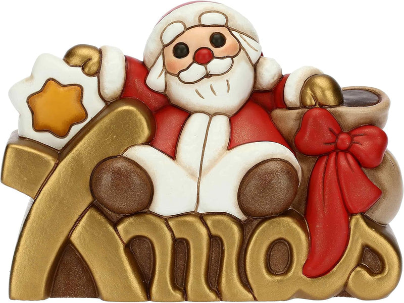 THUN - Weihnachten 2022 - Weihnachtsmann auf Xmas Schriftzug aus handverzierter Keramik - Weihnachts
