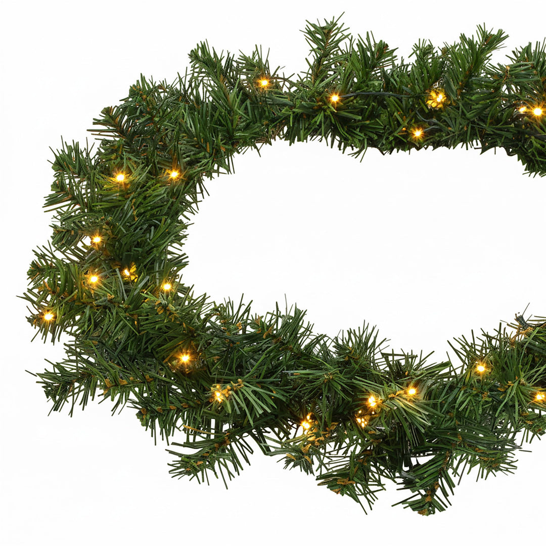 Spetebo Weihnachtsgirlande grün mit 100 LED Lichterkette warmweiss für Aussen - 810 cm - Kunst Tanne