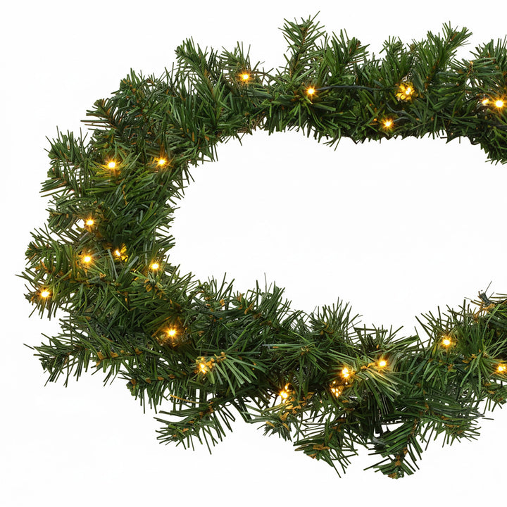 Spetebo Weihnachtsgirlande grün mit 100 LED Lichterkette warmweiss für Aussen - 810 cm - Kunst Tanne