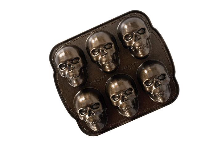 Nordic Ware Spuk Totenkopf-Muffins, Aluminium, Bronze, Haunted Skull Cakelet Pan Pfanne, Pfanne