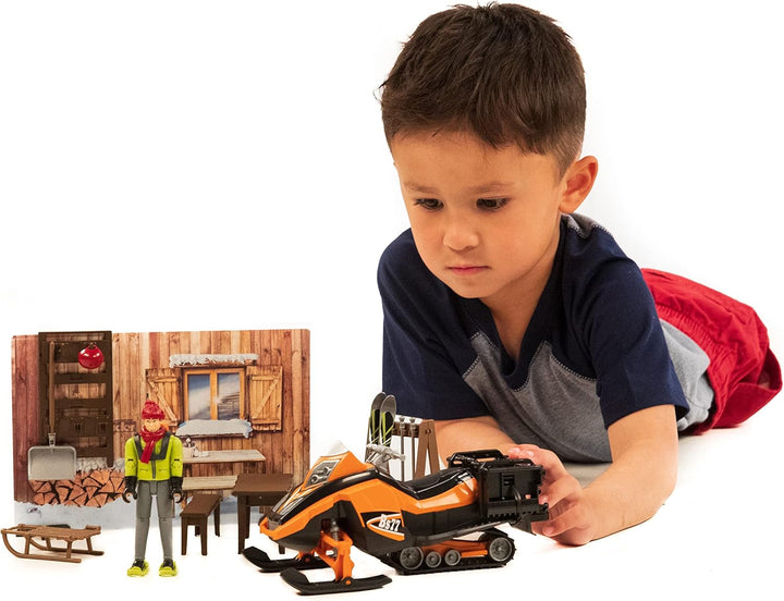 bruder 63102 - Bworld Berghütte mit Snowmobil & Figur - 1:16 Schneemobil Skifahrer Winter Spielzeug