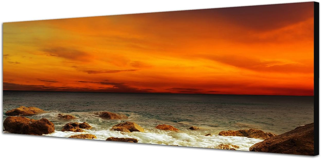 Paul Sinus Art Panoramabild auf Leinwand und Keilrahmen 150x50cm Meer Steine Felsen Abendrot Landsch