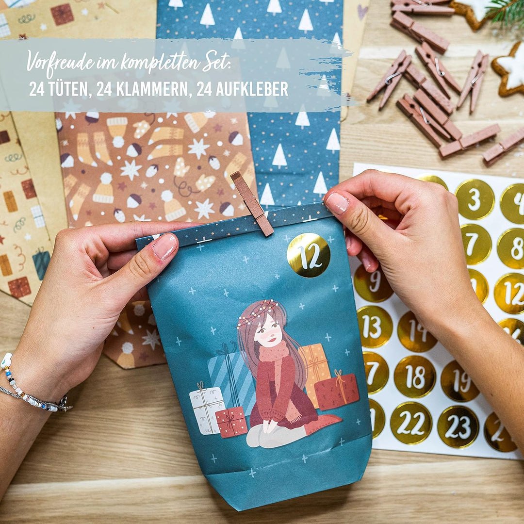Papierdrachen Adventskalender 2025 zum Befüllen - 24 braune & petrolfarbene bedruckte Geschenktüten