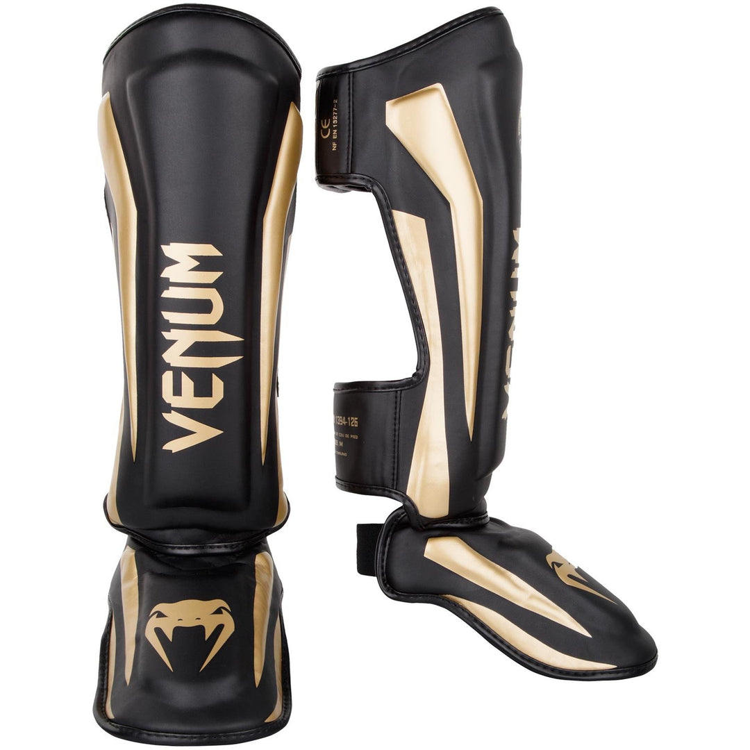 Venum Elite Boxen Schienbeinschutz XL Schwarz / Gold, XL Schwarz / Gold