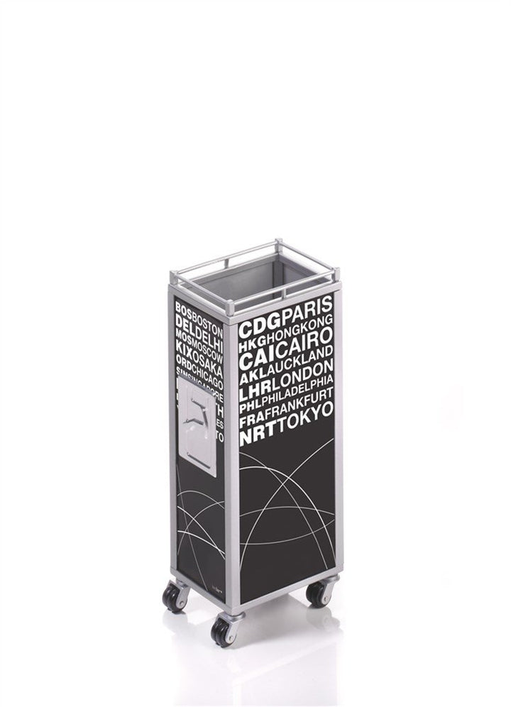 TROIKA Stifteköcher MINI TROLLEY - PHO07/BK - Stifteköcher, Trolley, Motiv "AIRPORTS" - schwarz / we