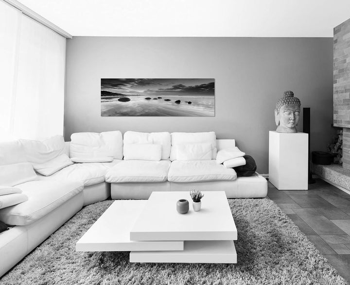 Paul Sinus Art Leinwandfoto als Panorama SCHWARZ/Weiss 120x40cm Neuseeland Meer Strand Steine Morgen