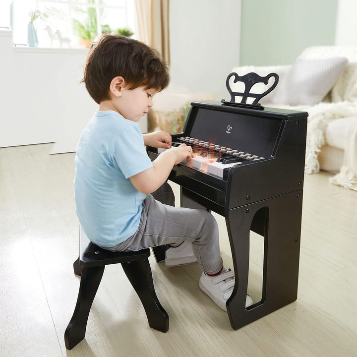 Hape Leuchttasten-Piano mit Hocker und Notenhalter, Musikspielzeug aus Holz, ab 3 Jahren, Schwarz
