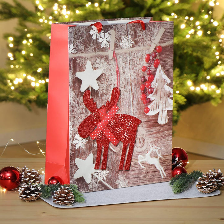 COM-FOUR® 12x XL Geschenktüte für Weihnachten, Nikolaus und Advent - Geschenktasche mit Weihnachtsmo