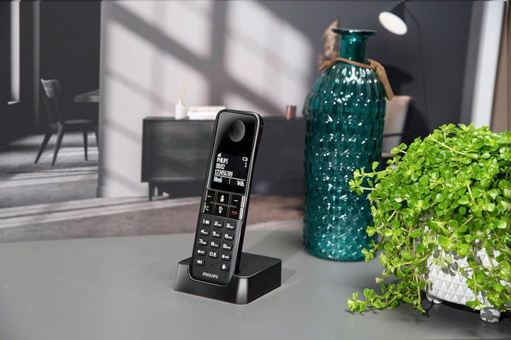 Philips D4701B Schnurloses Telefon mit 16 Stunden Sprechzeit, 4,6-cm-Display und Freisprechfunktion