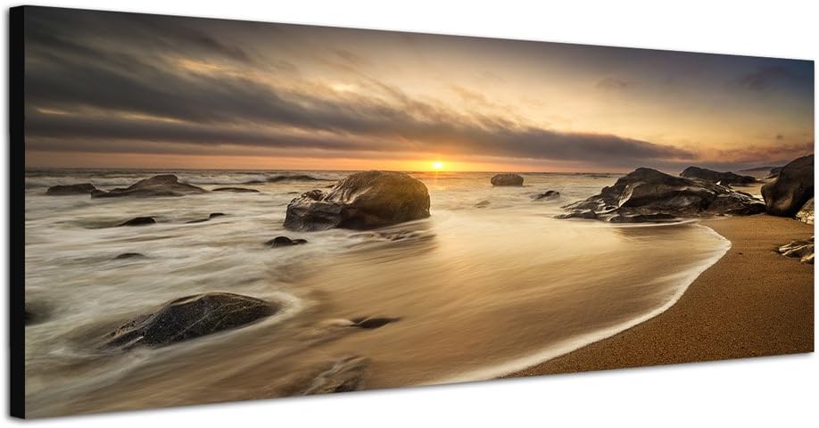 Paul Sinus Art Panoramabild auf Leinwand und Keilrahmen 150x50cm Meer Strand Steine Sonnenaufgang Wo