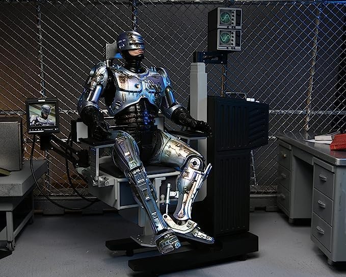 Neca Ultimate Robocop-Figur mit Stuhl, 20 cm 203605 Schwarz