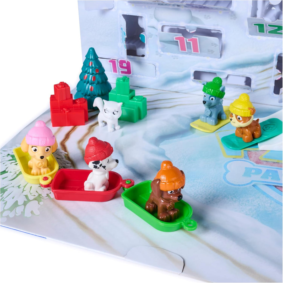 PAW PATROL Adventskalender 2026, ab 3 Jahren | 24 Türchen | 7 Hundefiguren | 6 Schlitten | Verpackun